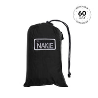 Black nylon ultralight tarp with drawstring closure and white NAKIE logo patch on front