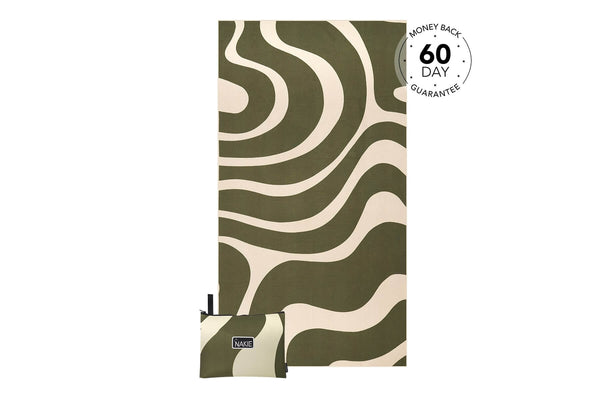 Eucalyptus green and cream wavy patterned recycled beach towel with rolled corner detail and Nakie brand tag.