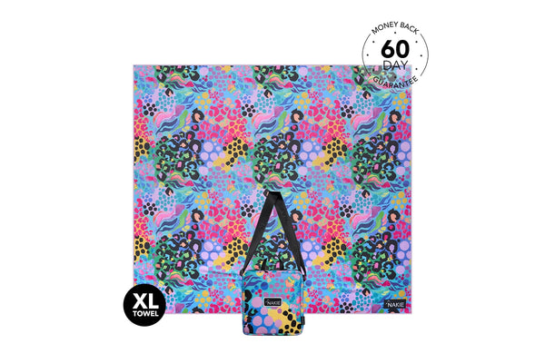 XL beach towel with vibrant multicolored abstract pattern in pink, blue, green