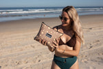 Luna Glow recycled sand-free beach towel in taupe with moon and celestial pattern, displayed at beach preview #5